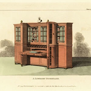 Regency-era library bookcase with tambour circular cupboards and fold-out writing desk