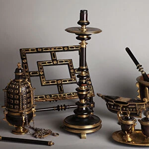 Set with a candlestick, thurible, lectern, wine cans, situla and aspergillum. Ebony wood and bronze. Liturgy set of the catafalque of the dukes of Pastrana. Before 1626