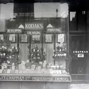 Shop window of J T Chapman Ltd, photograpgic chemists (b / w photo)
