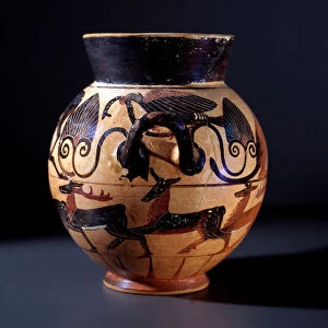 Terracotta bucket representing a predator attacking a snake and deers running, 520-510 BC