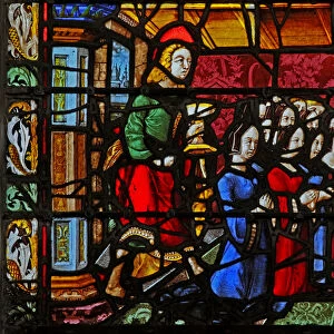 Window w2 depicting St John with the donors and (many!) daughters (stained glass)