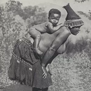 Woman carrying her baby on her back, South Africa (b / w photo)