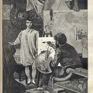 In a workshop, a young model in a shirt and sock wearing a small feather hat