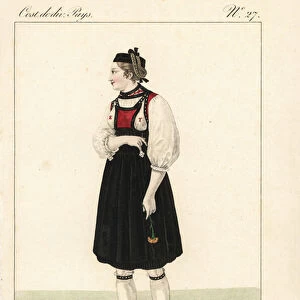 Young woman of Guggisberg, Canton of Bern, Switzerland, 19th century. Her hair braids are tied over her toquet, and her initials are embroidered on her breast either side of a small bib corset