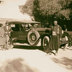 American Consul Oscars Heizer wife beside auto