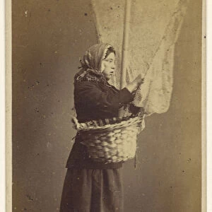 Peasant woman standing holding basket long pole