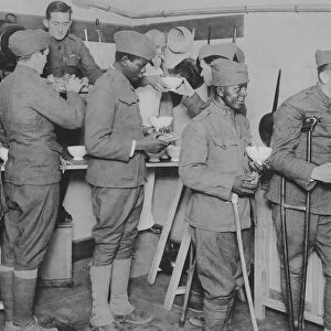 American soldiers getting their food in the American Red Cross canteen