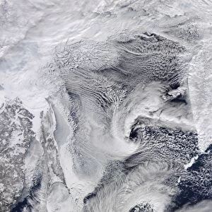 Far eastern Russia covered in snow, ice, and clouds