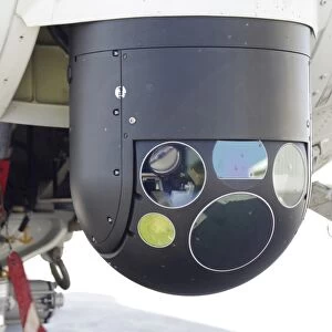 A FLIR camera mounted on an EH101 utility helicopter