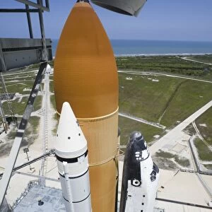 Space shuttle Atlantis lifts off from Kennedy Space Centers Launch Pad 39A into orbit