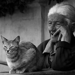Old woman with cat in Goz