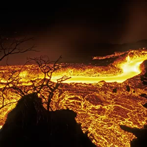 Lava flow in Fernandina Island, Galapagos Islands. Lava flowing at speed of water runs