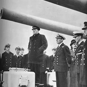 Addressing the Crew of H. M. S. Exeter on their return from the sinking of the Graf Spee at the b