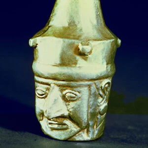 Anthropomorphic head shaped vase, made of silver and representing a hook-nosed person
