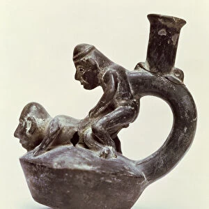 Anthropomorphic Vase with stirrup handle depicting two male persons performing a sex act