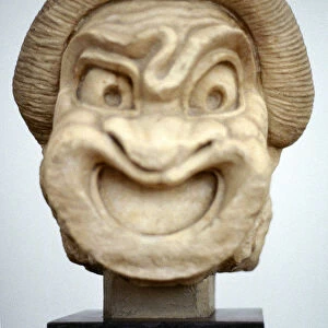 Carving of a mask used in Ancient Greek theatrical comedy, 3rd century BC