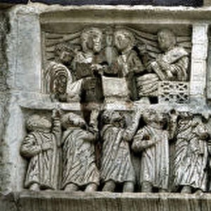 Constantine distributing money to the people (Liberalitas). Detail of the Arch of Constantine