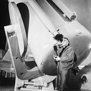 Edwin Powell Hubble (1899-1953), American astronomer, in the obsevatory