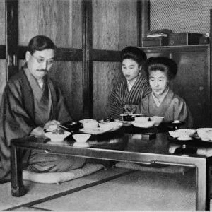 Family luncheon a la Japonaise, c1900, (1921). Artist: Julian Leonard Street