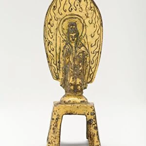 Guanyin (Avalokiteshvara) Standing before Flaming Aureole and Holding a Water