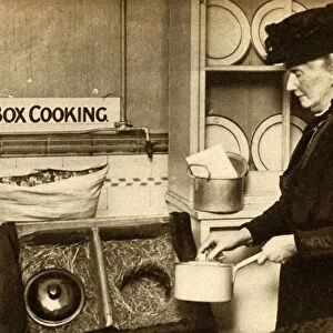 Hay box cooking, First World War, 1914-1918, (1933). Creator: Unknown