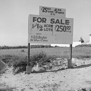Housing for rapidly growing fringe of lettuce workers on edge of town, Salinas, California, 1939. Creator: Dorothea Lange