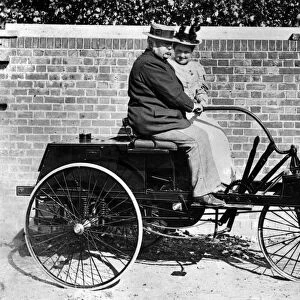 John Henry Knight and wife on Knight 1895 3 wheeler. Creator: Unknown