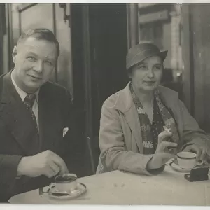 Natalia Goncharova and Mikhail Larionov at the Restaurant Petit Saint-Benoît, 1932. Creator: Anonymous