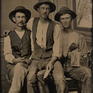 Three Painters, with Brushes and a Can of Paint, in Front of a Painted Window Backdrop
