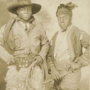 Photographic postcard portrait of two men in Western attire, early 20th century