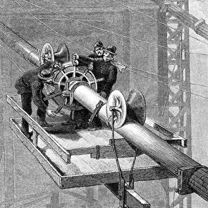 Putting wire wrapping around the suspension cables, Brooklyn Suspension Bridge, 1883