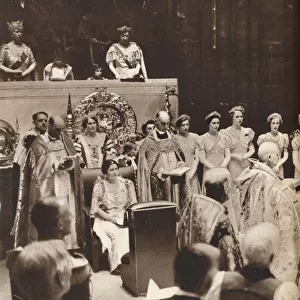 Queen Elizabeth looks on as her husband is crowned on the day of his coronation, 1937