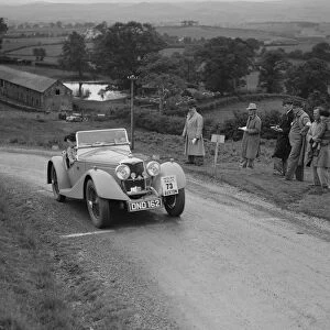 Riley Sprite 2-seater of Mrs TB Hague competing in the South Wales Auto Club Welsh Rally