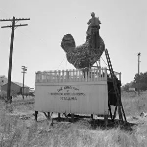 Roadside sculpture (under repair) on U. S. 101, entering Petaluma, Sonoma County, 1939. Creator: Dorothea Lange