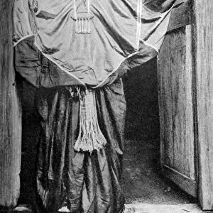 A woman from Harar in festival attire, Ethiopia, 1922