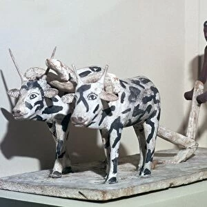 Wooden model of a man ploughing with oxen, from Egypt, Middle Kingdom, c2040-1750 BC