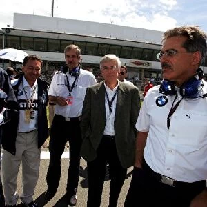 Formula One World Championship: Dr. Klaus Draeger BMWs Professor Joachim Milberg and Dr Mario Theissen BMW Sauber F1 Team Principal