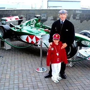 Sir Jackie Stewart and Max Sutton: Sir Jackie Stewart with Max Sutton and a Jaguar Racing Formula One car