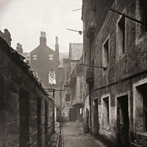 Close, 115 High Street, Glasgow, Scotland in the 1870 s. Photograph from The Old Closes and Streets of Glasgow, by Scottish photographer Thomas Annan 1829-1887