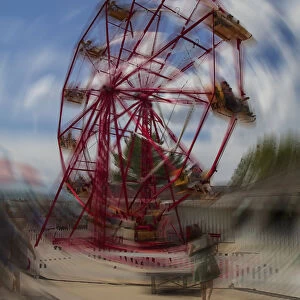 Ferris Wheel At Amusement Park, Motion Blur; Calgary, Alberta, Canada