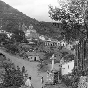 Historic image in black and white of a church in the town of Taxco, Mexico, circa 1920; Taxco, Guerrero, Mexico