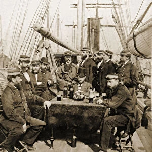 Historic image in sepia of a captain, crew and passengers on the deck of a steamboat, Victorian era