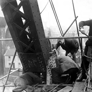 00608466 Foreman rivetter, Archie Ashcroft, with workmen at work on the new Silver