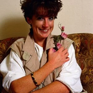 Amanda Kirby holding a flower November 1984