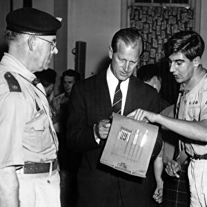 Andre Hobro aged 18, of 279 Birmingham Scout Group at Hall Green explains a map to