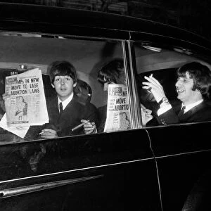 The Beatles leaving The Daily Mirror Golden Ball each with a copy of the paper