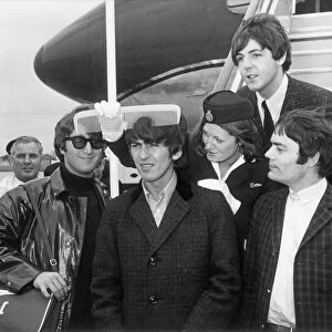The Beatles - with stand in drummer Jimmie Nicol - return to London Heathrow Airport
