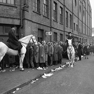 Birmingham City supporters queue for tickets for the FA Cup match against Manchester
