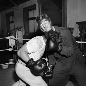Boxer Don Cockell seen here Training in a Brighton Gym for his next fight his sparring