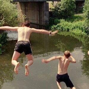 Boys jumping from bridge into water July 1997